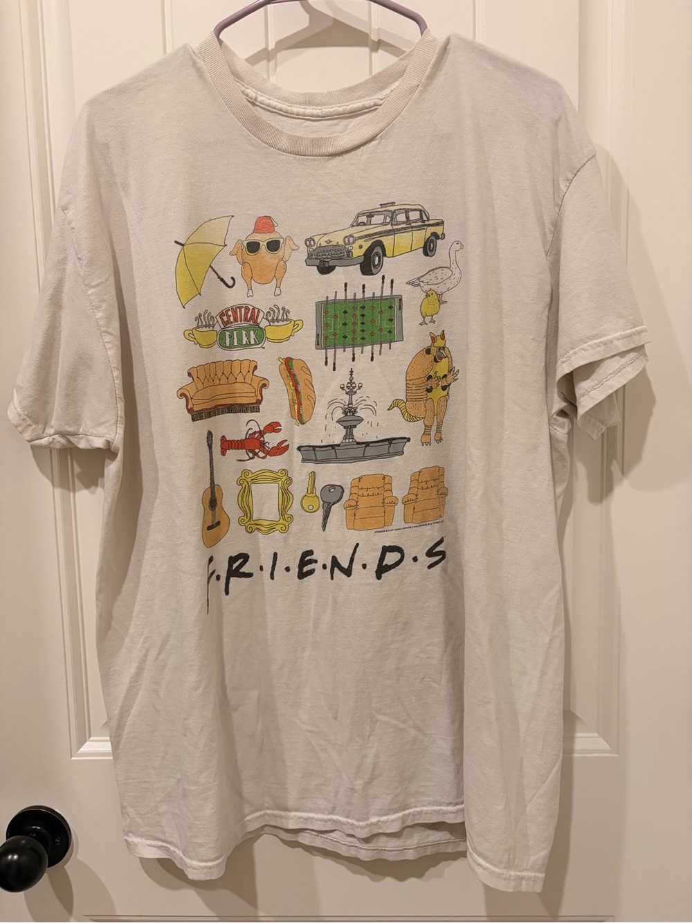 Vintage FRIENDS White Short Sleeve Tee with Multicolor Icon Grid 🛋️